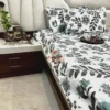 Full spread view of Azure Bloom Botanical Cotton Bedsheet Set highlighting overall botanical print and coordinated pillow covers.