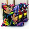 Pair of Birdsong Jungle embroidered cushion covers with floral and bird patterns