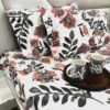 Closeup of Bold Blossom Bed Sheet Set pillow covers with large, bold floral motifs and leaf accents