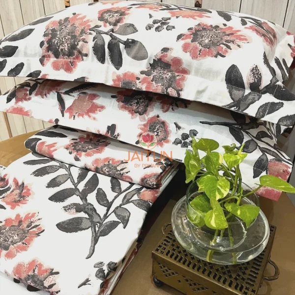 Bold Blossom Bed Sheet Set displayed with green plant decor and all-over floral prints for a fresh look