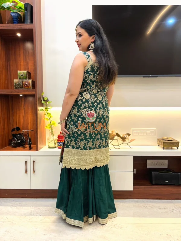 Back view of Emerald Enchant Wedding Collection Sharara Suit Set featuring green kurta with heavy gold embroidery and sharara pants