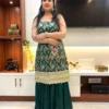 Front view of Emerald Enchant Wedding Collection Sharara Suit Set highlighting green kurta, gold embroidery, and wide-leg sharara