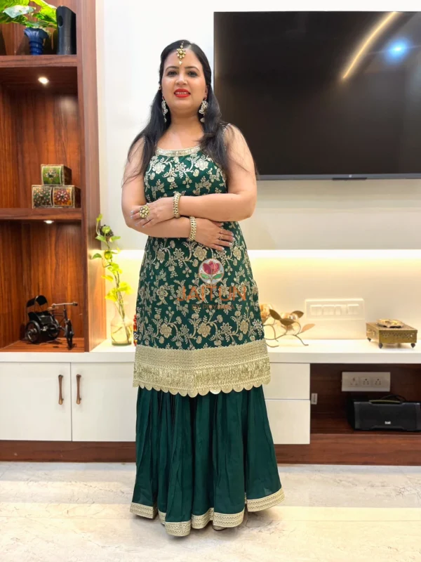 Front view of Emerald Enchant Wedding Collection Sharara Suit Set highlighting green kurta, gold embroidery, and wide-leg sharara