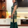 Side view of Emerald Enchant Sharara Suit Set with intricate floral gold embroidery and classic sharara silhouette