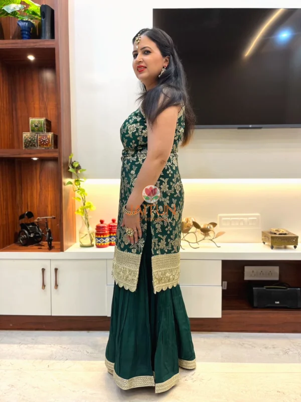 Side view of Emerald Enchant Sharara Suit Set with intricate floral gold embroidery and classic sharara silhouette