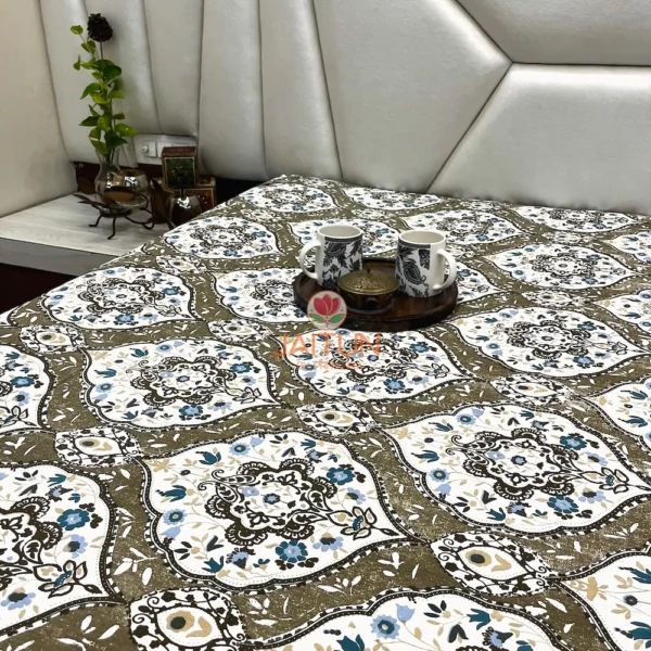 Heirloom Damask bed sheet set spread on bed, featuring damask floral print, cups on a tray, and soft beige headboard