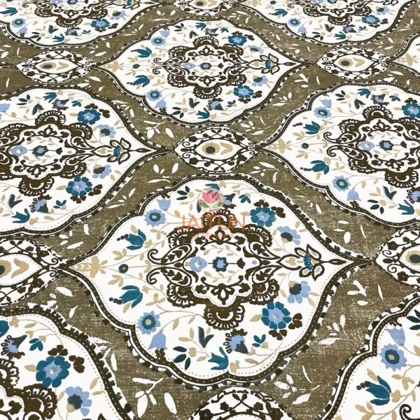 Closeup of Heirloom Damask bed sheet set showing fine details of brown, blue, and ivory damask floral pattern