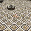 Full angled view of Kalahari Ikat Geometric Bed sheet Set with mustard, brown, and grey ikat diamond print on bed