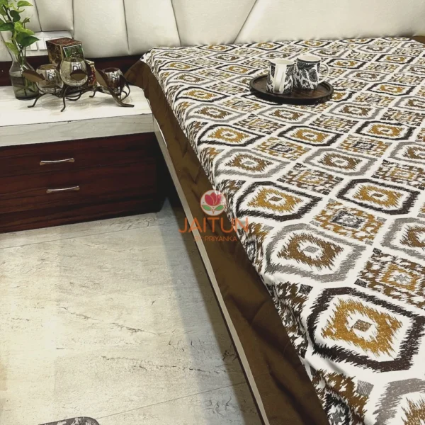 Kalahari Ikat Geometric Bedsheet Set displayed on bed, showing classic ikat diamond motifs and deep brown border