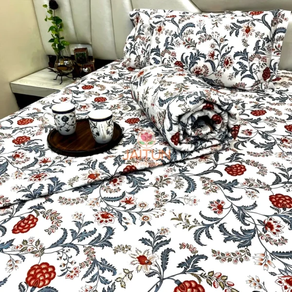 Bed styled with Royal Crimson Bloom cotton bed sheet and matching pillows, featuring a serving tray with floral cups for a cozy vibe.