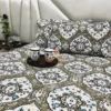 Decor view of Siena Heritage Damask Bed Sheet Set with floral damask motifs, styled with mugs on wooden tray
