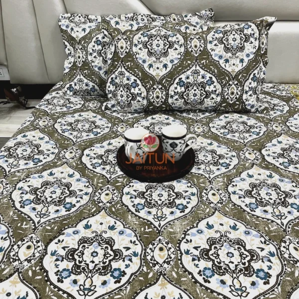 Full view of Siena Heritage Damask Bed Sheet Set covering bed and pillows, displaying olive green and blue damask prints