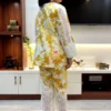 Back view of Sunlit Grace Co-ord Set with floral yellow print and scalloped white lace on pant hems