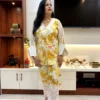 Sunlit Grace Co-ord Set with yellow floral print, lace trim pants, and detailed sleeves shown from the front