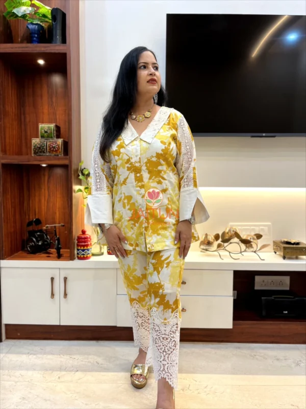 Sunlit Grace Co-ord Set with yellow floral print, lace trim pants, and detailed sleeves shown from the front