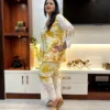 Sunlit Grace Co-ord Set side view highlighting the lace-embellished pants and yellow floral design