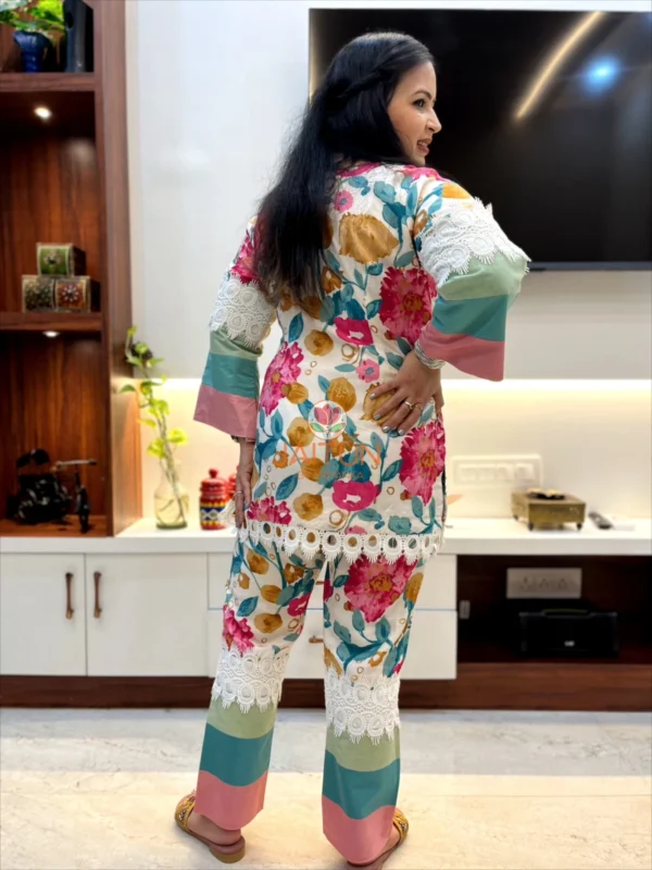 Back view of Tropical Bloom Co-ord Set with floral prints and pastel color block pants