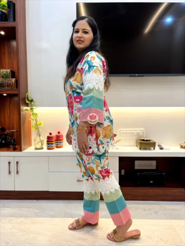 Woman wearing Tropical Bloom Co-ord Set side view showcasing floral print and lace details