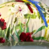 Tropical Parrot Paradise Cushion Cover Close-Up - Intricate Embroidered Flower Detail and Parrot Feathers