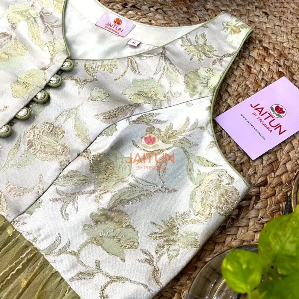 Close-up of the Designer Olive Garden Brocade Peplum Blouse highlighting floral embroidery, button accents, and luxury fabric texture for bridal wear.