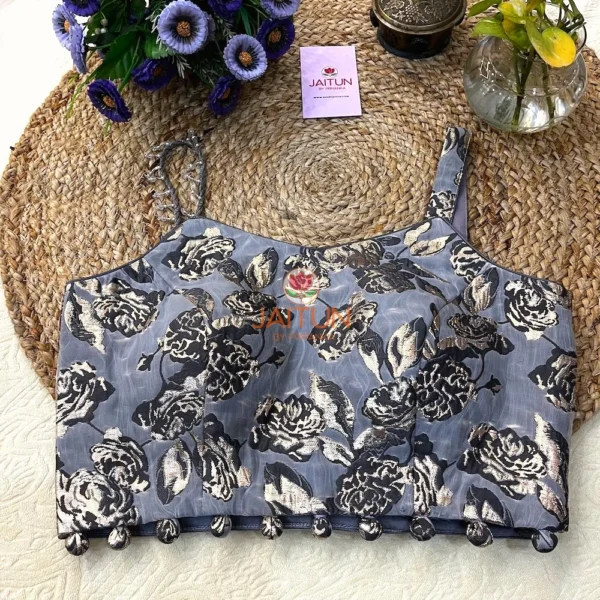 Front view of Midnight Bloom Metallic Floral Wedding Blouse featuring black and gold metallic floral weaving on a grey base, perfect for weddings and festive wear.