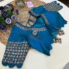 Detailed shot of the embellished neckline on Royal Blue Kundan Silk Blouse, highlighting kundan stones and shimmering sequins for bridal wear.