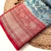 Sea Green Banarasi Saree Pallu Close-Up Sea Green Banarasi Silk Saree with maroon zari border pallu close view