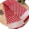 Regal Red Pure Banarasi Silk Saree with golden zari boota and contrast border main view Regal Red Pure Banarasi Silk Saree neatly folded, showing all over golden zari boota and contrast geometric border on mat