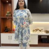 Full-length front view of Floral Bloom Co-Ord Set in ivory white and blue floral print with lace-trim pants