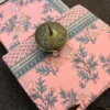 Blush Carnation Bedsheet – Border Design Close-Up Blush Carnation pink bedsheet close-up showing floral print and contrasting grey patterned border