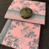 Blush Carnation Bedsheet – Floral Print Detail Close-up of Blush Carnation bedsheet featuring delicate floral motifs and grey decorative border on blush pink