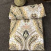Desert Royale Bedsheet – Folded Set Desert Royale printed bedsheet featuring an intricate oversized floral and ornamental motif