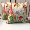 Pair of Flora Royal embroidered floral cushion covers featuring vibrant botanical motifs and handcrafted embroidery