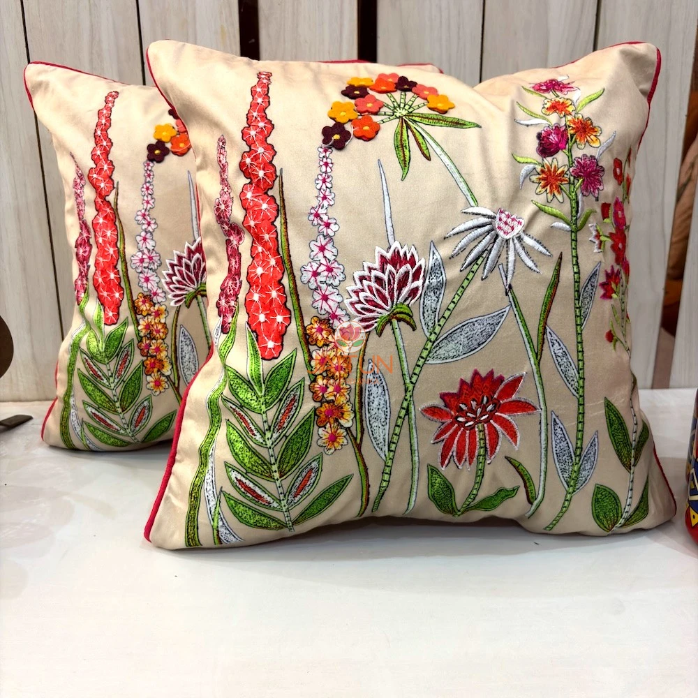 Pair of Flora Royal embroidered floral cushion covers featuring vibrant botanical motifs and handcrafted embroidery