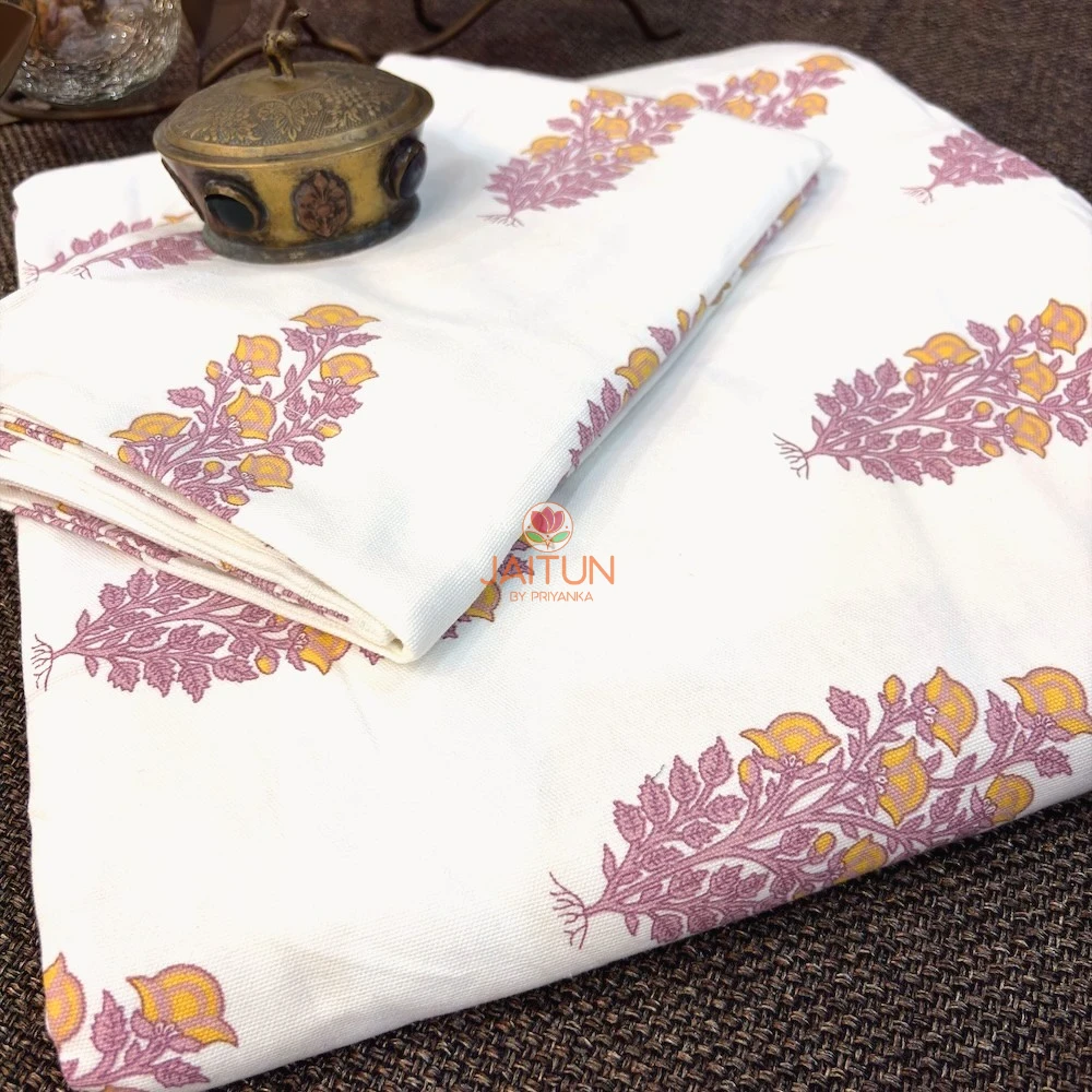 Close-up fabric view of Foliage Petals Ivory bedsheet with floral foliage motifs