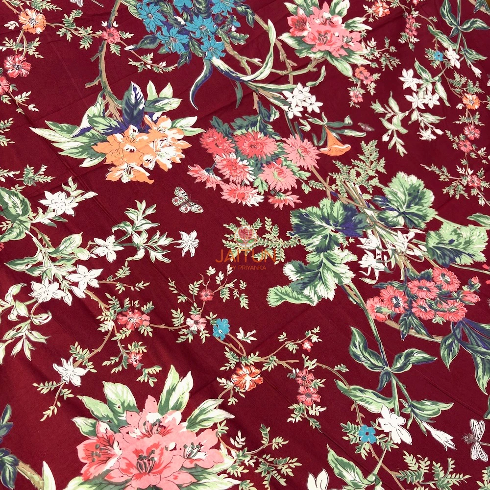 Gulzar Bloom Wine Red Double Bedsheet featuring pink, blue and peach florals with green botanical motifs