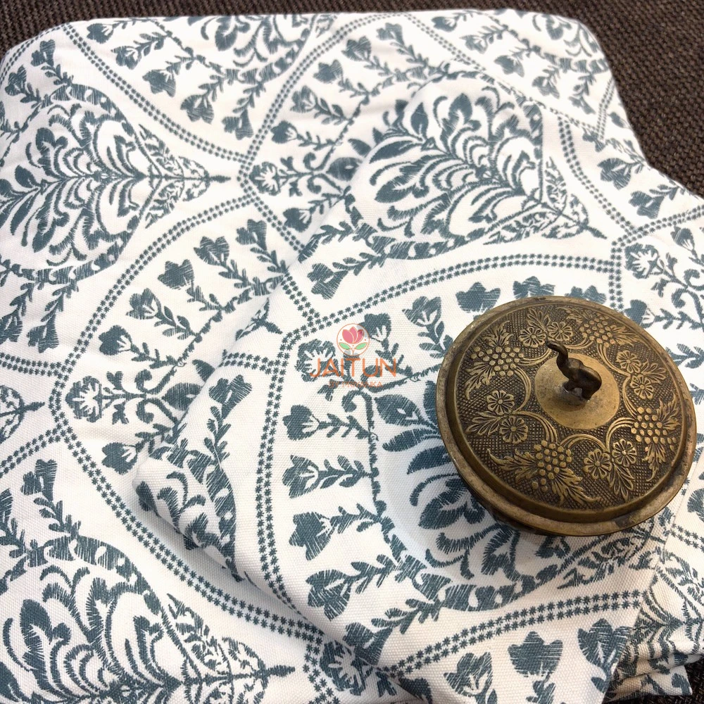 Close-up of Indigo Fern Bedsheet showing detailed indigo floral and fern motifs on ivory fabric