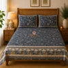 Midnight Botanica printed double bedsheet with two matching pillow covers styled on a bed by Jaitun