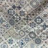 Close-up of Moroccan Mist Bed Sheet with intricate blue and sage geometric tile print