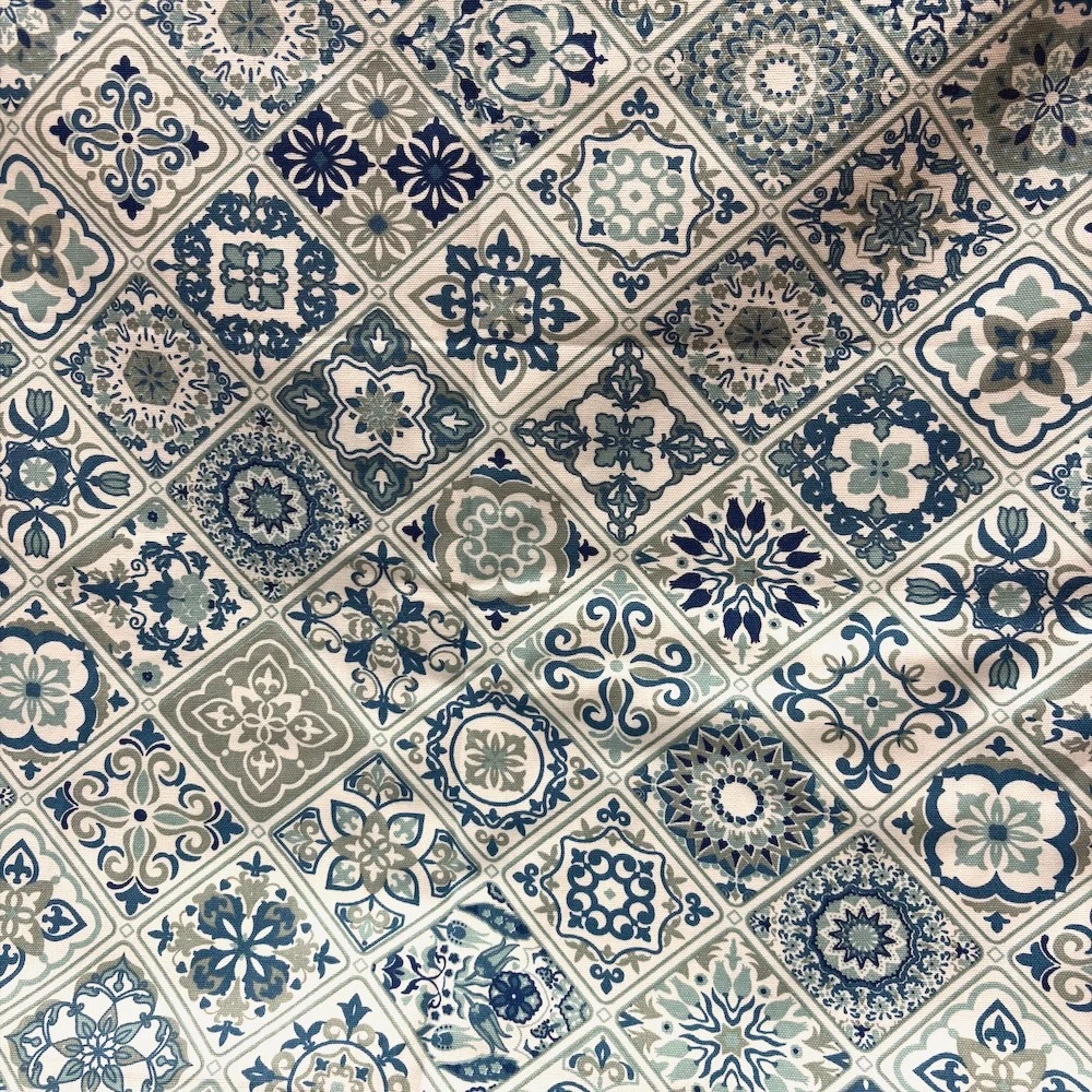 Close-up of Moroccan Mist Bed Sheet with intricate blue and sage geometric tile print