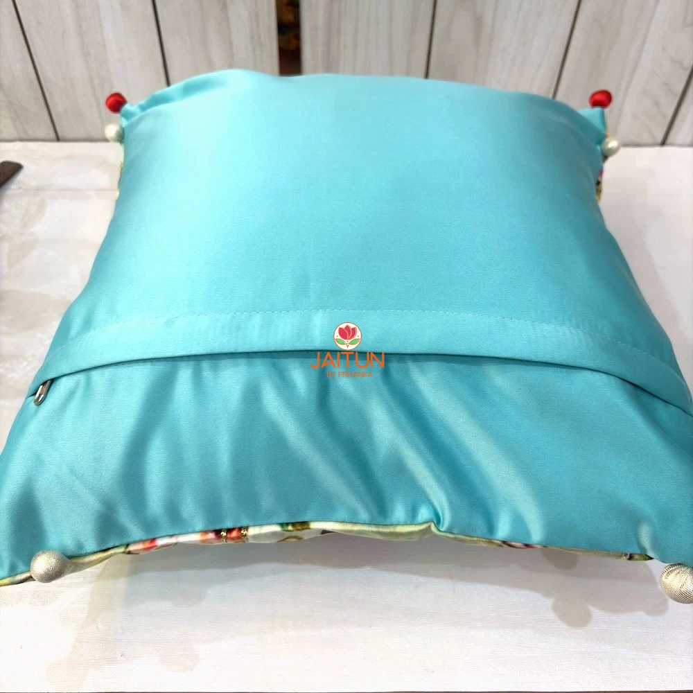 Back view of Emerald Peacock Blossom Embroidered Cushion Cover with concealed zipper closure and aqua satin backing