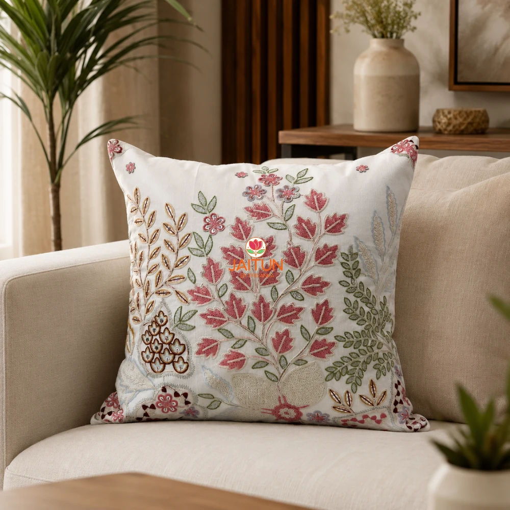 Rosé Botanica Floral Embroidered Cushion Cover Rosé Botanica embroidered cushion cover featuring blush pink flowers, sage green leaves, and elegant botanical motifs on premium ivory fabric.