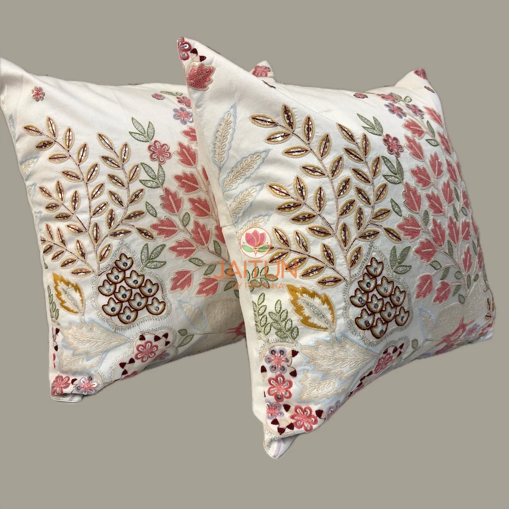 Rosé Botanica Handcrafted Embroidered Cushion Covers – Detail View Decorative Rosé Botanica cushion covers showcasing detailed botanical embroidery, textured leaf patterns, floral accents, and premium artisanal craftsmanship.