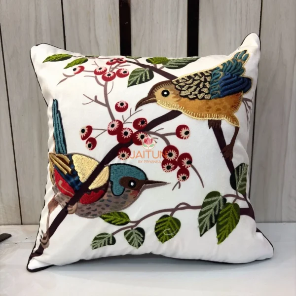 Songbirds Embroidered Cushion Cover featuring colorful birds perched on branches with botanical embroidery on an ivory background