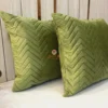 Side perspective of Sage Green Velvet Luxe Zigzag Cushion Cover with geometric textured velvet detailing