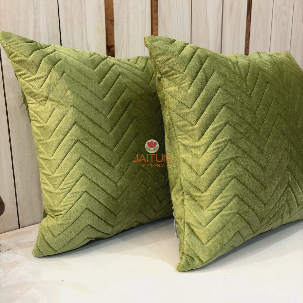 Side perspective of Sage Green Velvet Luxe Zigzag Cushion Cover with geometric textured velvet detailing