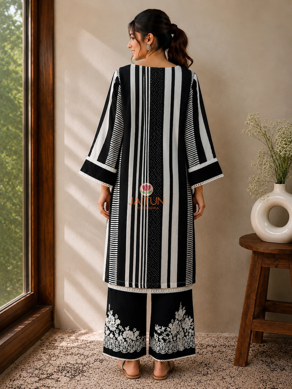 Black Ivory Elegance Kurta Set – Back View Black Ivory Elegance Kurta Set back view with striped kurta and embroidered pants