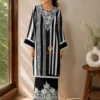 Black Ivory Elegance Kurta Set – Side View Black Ivory Elegance Kurta Set side view with striped kurta and embroidered pants