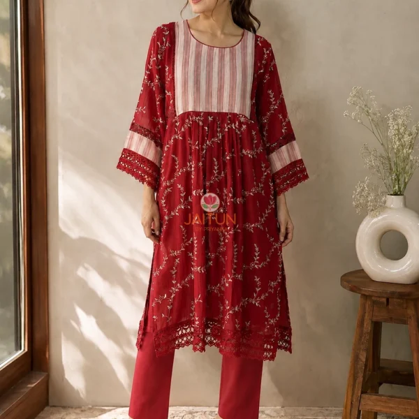 Crimson red embroidered kurta with striped yoke and lace-trimmed sleeves by Jaitun