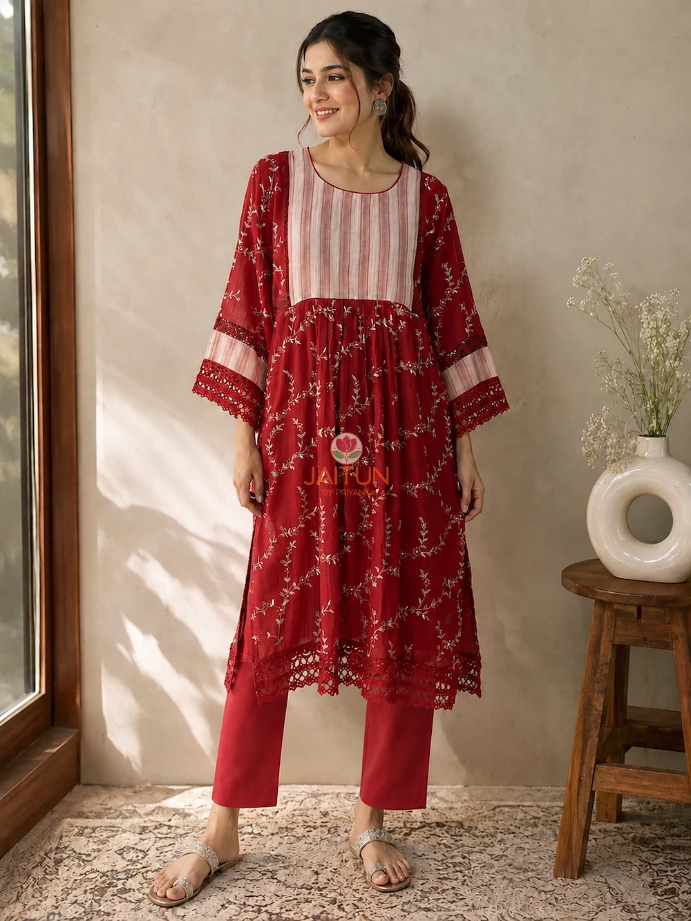 Crimson red embroidered kurta with striped yoke and lace-trimmed sleeves by Jaitun